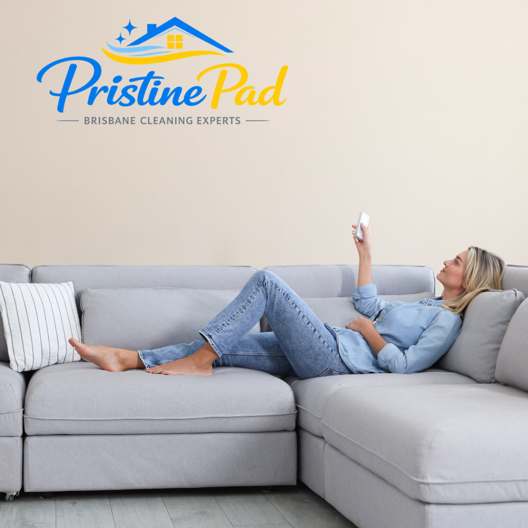Pristine Pad Relaxing on freshly cleaned couch. Deep cleaning for larger sofas and lounges using professional upholstery cleaning equipment.